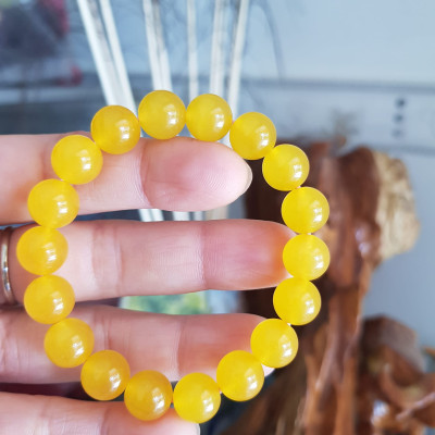 Chiếc Vòng tay đá mã não vàng anh tươi quá đẹp  Size hạt 10mm Nữ mệnh kim thổ thủy đeo  Vòng vàng anh này người lớn trẻ em nhỏ đeo được hết ạ rất là xinh xắn luôn