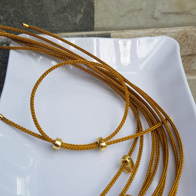 Dây thun VÀNG dẻo 2mm phối vòng tay Charm hạt đá hạt lu thống Size dây đỏ 2mm Nữ đã có hạt lu thống thì đây chính là sợi dây thun VÀNG phối với hạt lu thống đeo xinh ạ