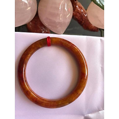 CHIẾC VÒNG TAY ĐÁ CẨM THẠCH TỨ QUÝ SIZE 49MM MỚI  MÀU CAM BÔNG VÀNG ĐỎ CHANH ĐẬM BÓNG ĐẸP XINH LẠ LẮM  NỮ MỆNH THỔ HOẢ KIM 45kg đến 52kg Đeo ạ