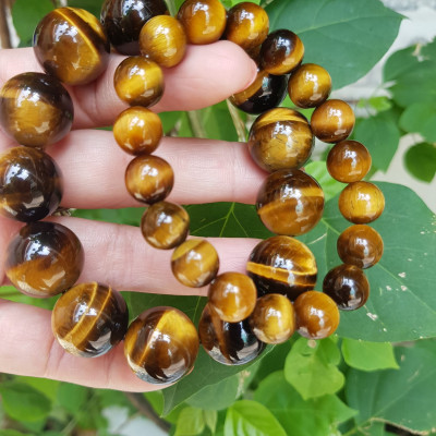 Vòng tay cặp Đá Mắt Hổ Tự Nhiên Vàng Nâu đem lại sự giàu có may mắn Vòng phù hợp với vợ chồng anh chị mệnh Thổ và mệnh Kim ạ Cặp vòng size 10mm và 16mm đeo rất đẹp tốt ạ
