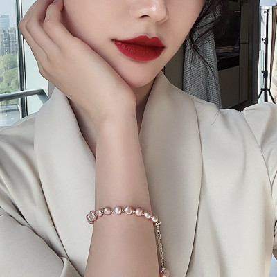 Lắc tay ngọc trai thật, Kiểu Hàn Quốc, hạt dẹt, cỡ hạt 6-8li, Trọng lượng 40-42 Carat, Kèm bản Photo CHỨNG THƯ GIÁM ĐỊNH TẠI SACOMBANK - Bản full mã số, Kèm hộp đựng Cẩm Tú