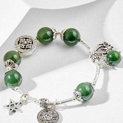 Vòng tay ngọc bích charm bánh xe pháp luân Ngọc Quý Gemstones