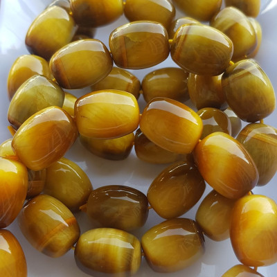 Vòng Tay Phong Thủy Nam Mệnh Thổ Kim Thủy Mới Đẹp Hạt Lu Thống Mới Vàng Nâu bóng đẹp Chất liệu đá mắt hổ tự nhiên vàng nâu bóng đẹp ạ Size hạt 14mm x dài 19mm ạ