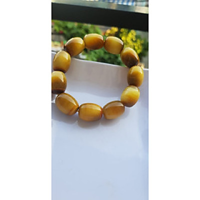 Vòng Tay Phong Thủy Nam Mệnh Thổ Kim Thủy Mới Đẹp Hạt Lu Thống Mới Vàng Nâu bóng đẹp Chất liệu đá mắt hổ tự nhiên vàng nâu bóng đẹp ạ Size hạt 14mm x dài 19mm ạ