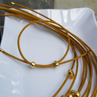 Dây thun VÀNG dẻo 2mm phối vòng tay Charm hạt đá hạt lu thống Size dây đỏ 2mm Nữ đã có hạt lu thống thì đây chính là sợi dây thun VÀNG phối với hạt lu thống đeo xinh ạ