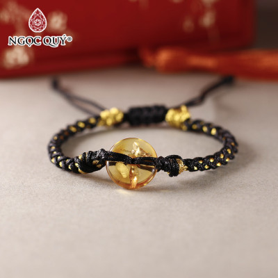 Vòng tay thắt dây đồng điếu hổ phách - Ngọc Quý