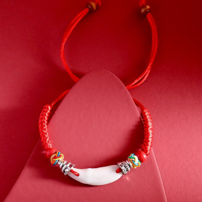 VÒNG TAY , LẮC TAY DÂY ĐỎ NANH CHÓ MỰC TRỪ TÀ HỘ MỆNH