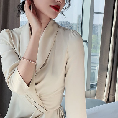 Lắc tay ngọc trai thật, Kiểu Hàn Quốc, hạt dẹt, cỡ hạt 6-8li, Trọng lượng 40-42 Carat, Kèm bản Photo CHỨNG THƯ GIÁM ĐỊNH TẠI SACOMBANK - Bản full mã số, Kèm hộp đựng Cẩm Tú