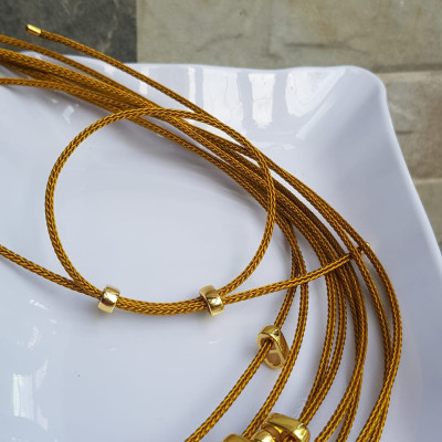 Dây thun VÀNG dẻo 2mm phối vòng tay Charm hạt đá hạt lu thống Size dây đỏ 2mm Nữ đã có hạt lu thống thì đây chính là sợi dây thun VÀNG phối với hạt lu thống đeo xinh ạ