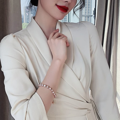 Lắc tay ngọc trai thật, Kiểu Hàn Quốc, hạt dẹt, cỡ hạt 6-8li, Trọng lượng 40-42 Carat, Kèm bản Photo CHỨNG THƯ GIÁM ĐỊNH TẠI SACOMBANK - Bản full mã số, Kèm hộp đựng Cẩm Tú