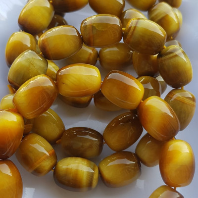 Vòng Tay Phong Thủy Nam Mệnh Thổ Kim Thủy Mới Đẹp Hạt Lu Thống Mới Vàng Nâu bóng đẹp Chất liệu đá mắt hổ tự nhiên vàng nâu bóng đẹp ạ Size hạt 14mm x dài 19mm ạ