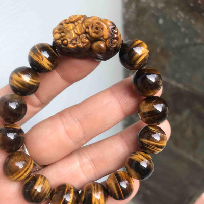 CHIẾC VÒNG ĐÁ MẮT HỔ TỲ HƯU 12ly VÀNG NÂU HÚT TÀI NAM MỆNH KIM THỔ ĐÁ TỰ NHIÊN BÓNG ĐẸP 