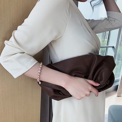 Lắc tay ngọc trai thật, Kiểu Hàn Quốc, hạt dẹt, cỡ hạt 6-8li, Trọng lượng 40-42 Carat, Kèm bản Photo CHỨNG THƯ GIÁM ĐỊNH TẠI SACOMBANK - Bản full mã số, Kèm hộp đựng Cẩm Tú