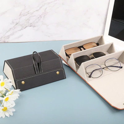 Hộp da PU đựng mắt kính 3 ngăn cuộn tròn , có nút bấm tiện lợi ,có thể treo hoặc xách , mang đi mọi nơi , bảo vệ mắt kính khỏi bụi và hư hỏng 