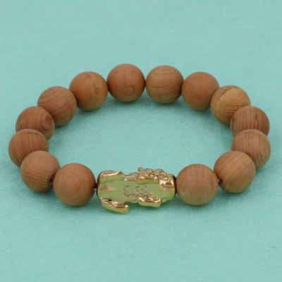 Vòng tay gỗ hoàng đàn 12 ly - cẩn Tỳ Hưu inox vàng VGHDTHV12