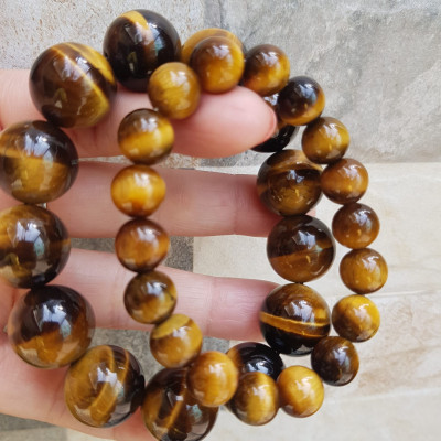 Vòng tay cặp Đá Mắt Hổ Tự Nhiên Vàng Nâu đem lại sự giàu có may mắn Vòng phù hợp với vợ chồng anh chị mệnh Thổ và mệnh Kim ạ Cặp vòng size 10mm và 16mm đeo rất đẹp tốt ạ