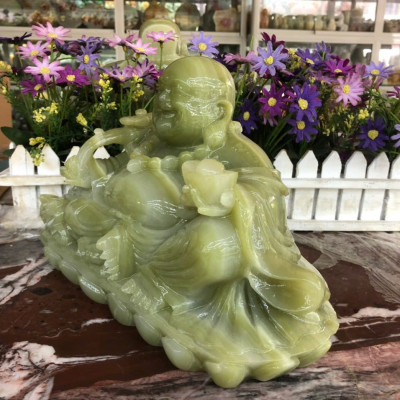 Tượng Phật Di Lặc ngồi tựa bao tiền cầm thỏi vàng phong thủy đá ngọc onyx