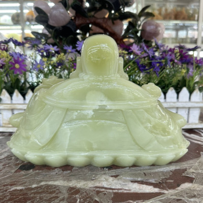 Tượng Phật Di Lặc ngồi tựa bao tiền cầm thỏi vàng phong thủy đá ngọc onyx - Dài 30 cm