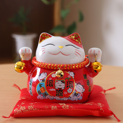 Mèo thần tài lục lạc  may mắn thu hút tài lộc , có khe để tiền , kèm đệm lót xinh xắn  , đem nhiều may mắn đến cho gia chủ 