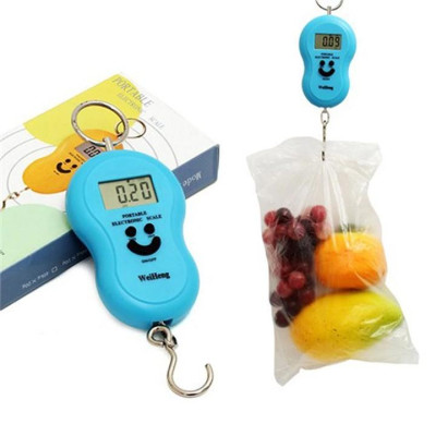 CÂN ĐIỆN TỬ CẦM TAYCÂN MINI ĐIỆN TỬ CẦM TAY HÌNH MẶT CƯỜI SỬ DỤNG CÂN HÀNG HOẶC ĐI CHỢ TIỆN LỢI