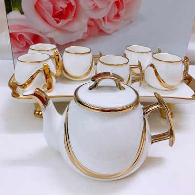 ẤM CHÉN SỨ TRẮNG VIỀN VÀNG