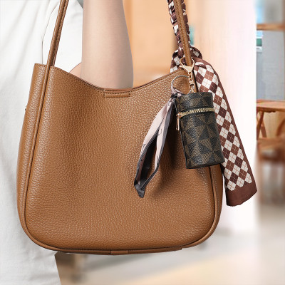 Móc khóa da - túi  đựng  đa năng ,son môi mini , tai nghe nhỏ gọn và tiện lợi