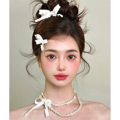 Dây chuyền hạt trai hai tầng đính nơ kèm nơ cài tóc