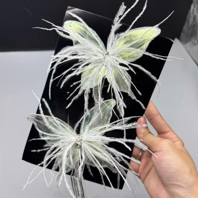 Cài tóc cô dâu bướm lông vũ ánh xanh ngọc mẫu mới