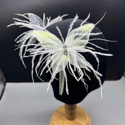 Cài tóc cô dâu bướm lông vũ ánh xanh ngọc mẫu mới