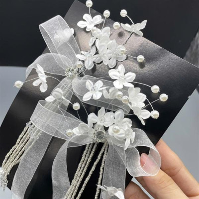 Nơ ruy băng voan cài tóc đính hoa chấm hạt trai