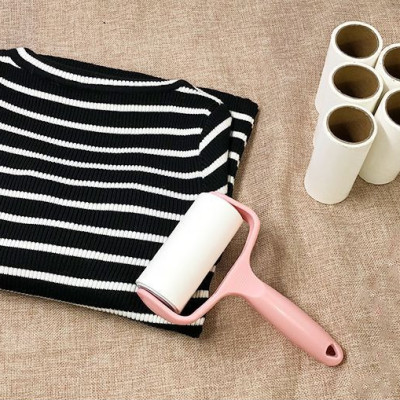 Cây lăn bụi quần áo và nhặt lông chó mèo