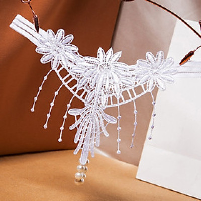 Quần lọt khe tua rua hạt cườm massage thoải mái