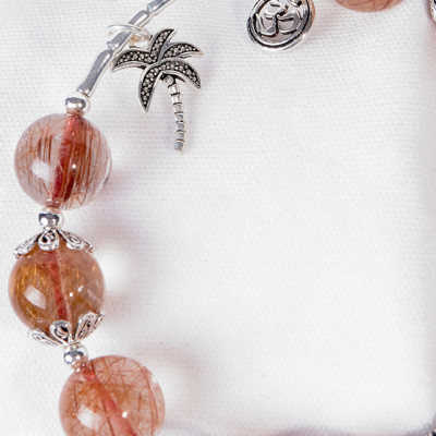 Vòng Thạch Anh Tóc Đỏ Phối Charm Voi Bạc Ngọc Quý Gemstones