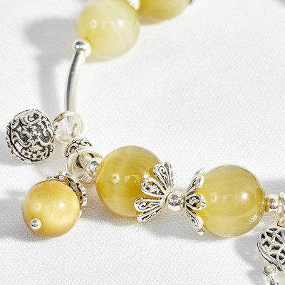 Vòng thạch anh mắt hổ vàng tươi phối charm dream catcher Ngọc Quý Gemstones