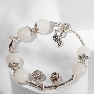 Vòng tay thạch anh ưu linh trắng phối hồ ly Ngọc Quý Gemstones